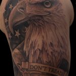 Chris DeLauder Tattoo Artist black and grey eagle and flag before