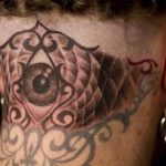 Chris DeLauder Tattoo Artist black and grey eye back of head