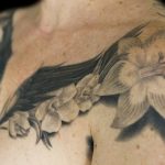 Chris DeLauder Tattoo Artist black and grey wings flowers full chest 2