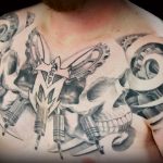 Chris DeLauder Tattoo Artist black grey skull gear full chest