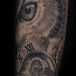 Chris DeLauder Tattoo Artist black and grey owl with clock 2