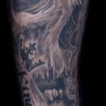Chris DeLauder Tattoo Artist black and grey skull