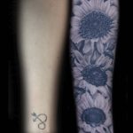 Emily Graven Tattoo Artist black and grey flower