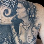 Chris DeLauder Tattoo Artist black and grey right back