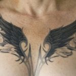 Chris DeLauder Tattoo Artist black and grey wings flowers full chest 3